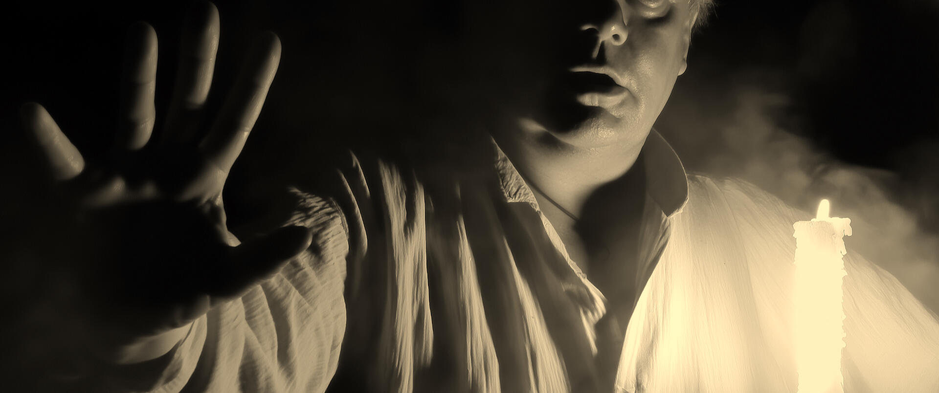 The whisperer with a candle